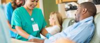 woman treating a patient